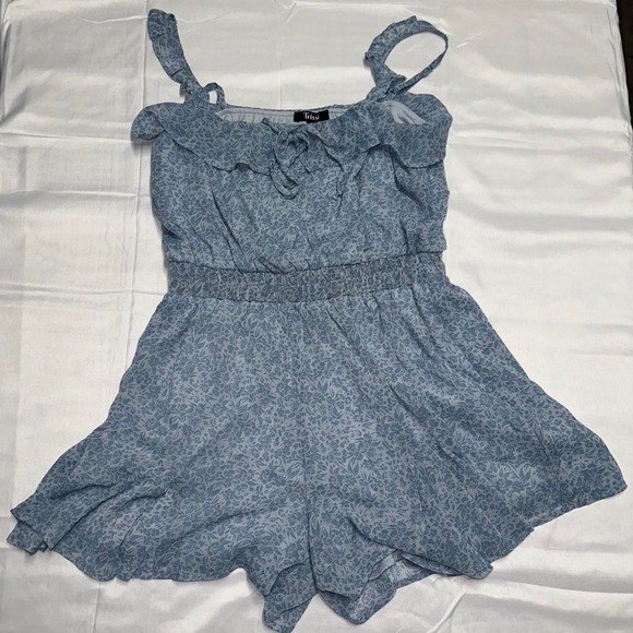 Pants - Trixxi women's floral romper in a pretty dusty/light blue